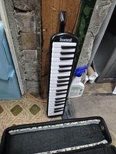 Melodica. 37 keys. Used, with