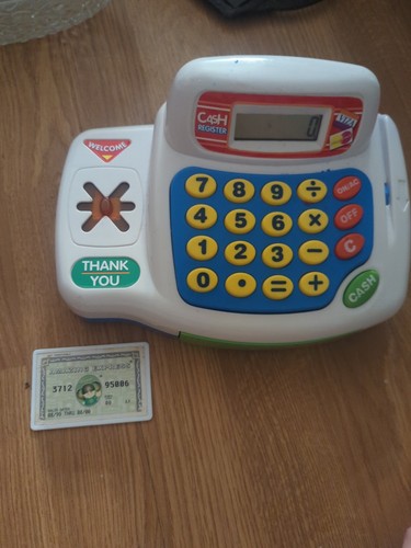 Toy cash register and credit - and,