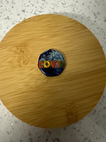 Enamelled hand painted coin - &,