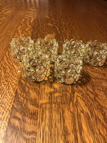 Elegant gold tone napkin - , rings