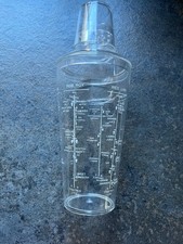 Retro plastic cocktail shaker with six recipes and measures on the sides. 3 pce