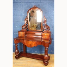 A Victorian Carved Mahogany