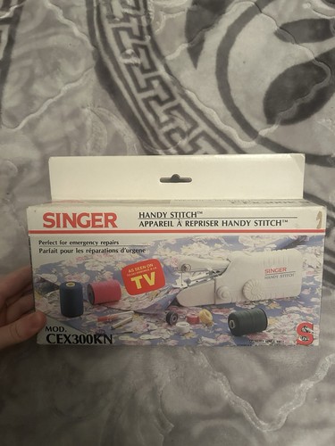 Singer handheld sewing machine - singer,
