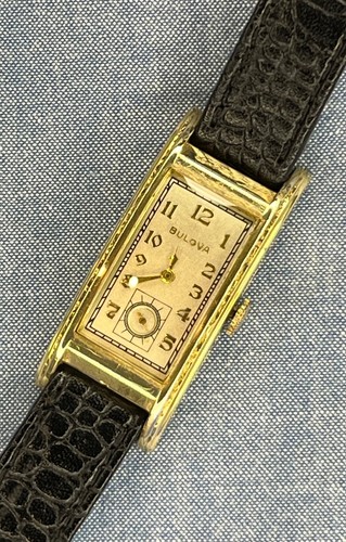 Bulova 1937 president curved - 1937, "president"