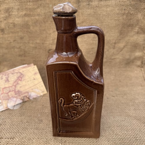 Antique brown stoneware spirit - antique,