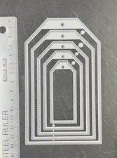 Metal die tag label stitched