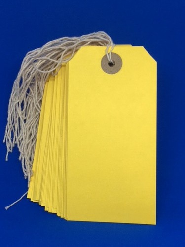 Yellow strung tie tags - yellow, on