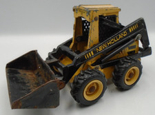 VINTAGE ERTL 1/16 NEW HOLLAND SKID STEER PLAY WORN CONDITION HEAVY DIECAST READ
