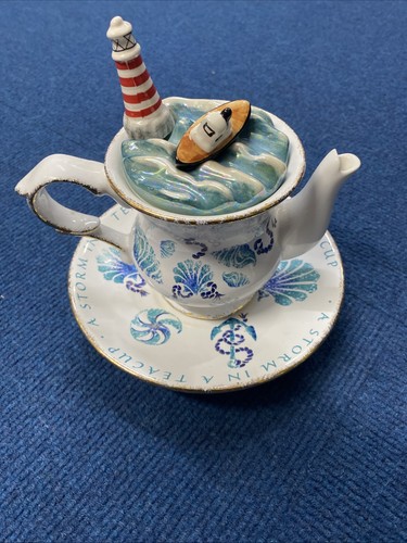 Storm teacup lighthouse - storm,