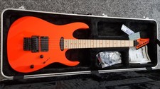 Ibanez RG565 Genesis Fluorescent Orange + Gator case