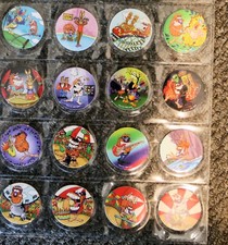 CADBURY 1995 COMPLETE SET SIXTEEN POGS CAPS IN SLEEVE EXCELLENT CONDITION