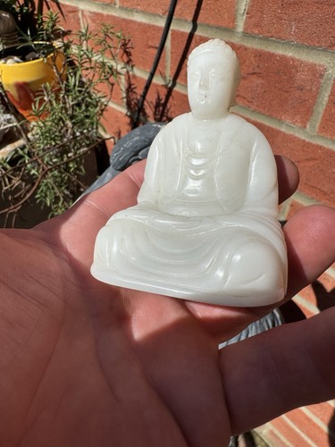 White stone carved buddha - carved,