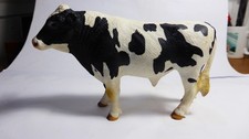 SCHLEICH bundle. Holstein bull, Friesian bull, Hereford cow, plus calf (ELC?)