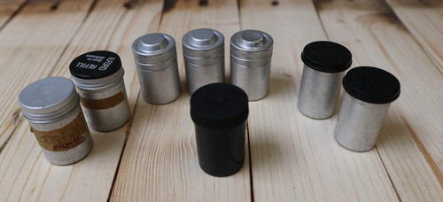 Empty 35mm film canisters - empty,