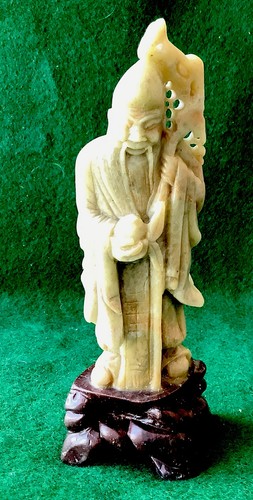 Hand carved green stone - hand,