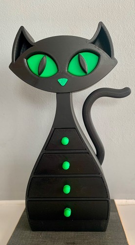 Black and green cat - 🐾,