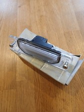 Nissan Almera N15 Hatchback,number plate lamp,new in pack genuine part.