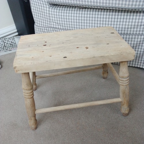 Antique foot milking stool