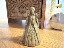 This item is a vintage brass