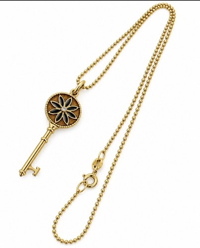 Tiffany 18k yellow - co,
