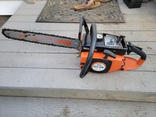 TANAKA ECS-506 CHAINSAW RUNS PARTS OR REPAIR