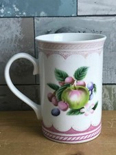 A Retro and Colourful Fruit Themed Tea Cup with Pink Bordering 
