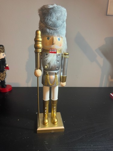 Silver and gold nutcracker - and,