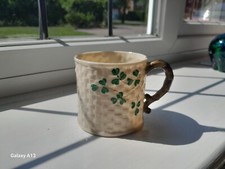 Belleek shamrock basketweave china mug. Black mark 1920. Excellent condition