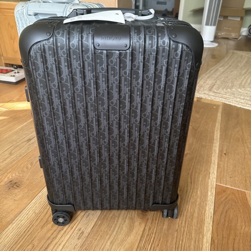 New with tag dior rimowa - tag,