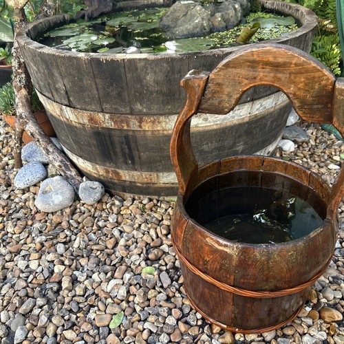 Antique wooden well bucket - well,