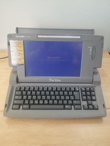 Vintage sharp fontwriter - sharp,