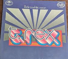 T Rex. Ride A White Swan.