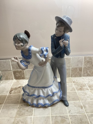 Nao lladro figurine - by,