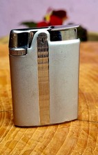 Ronson Varaflame  Sleek Retro Gas Lighter Good Working Condition.
