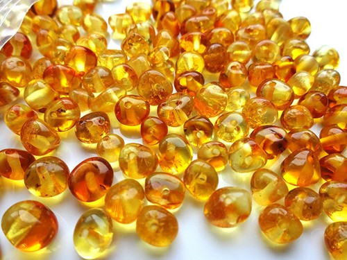 Real baltic holed amber - holed, loose