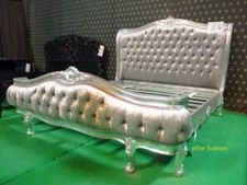 Upholstered designer bed hand