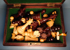 Modern Rosewood and Boxwood large weighted chess set, with antique Rosewood box.