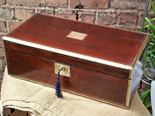 Brass edged Rosewood Writing Slope with 2 locks and keys and 3 secret drawers
