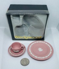 WEDGWOOD JASPERWARE PINK MINIATURE TEACUP, SAUCER AND PLATE IN BOX