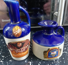 2 excellent vintage small Dolfi Curaçao and Pussers Rum decanters / flagons.