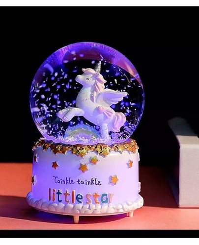 Unicorn snow globe - snow, music