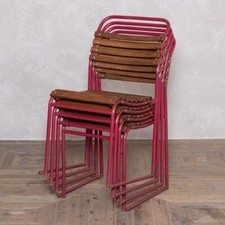 VINTAGE STACKING CHAIRS WITH SLATTED PLYWOOD SEAT AND BACK AND RED STEEL FRAME