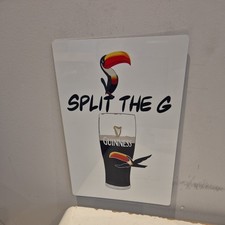 Guinness split the g metal