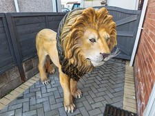 life-size lion garden statue