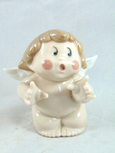 Nao lladro surprise - by,