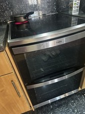 AEG Double oven DUK-731110M Black and silver 