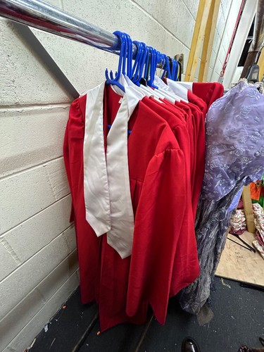 Red choir robes with white