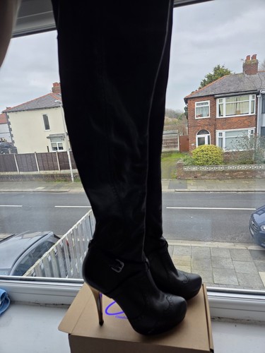 Black with red bottoms - with,