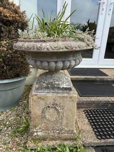 Large pair weathered urn - of,