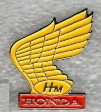Honda Motorcycle pin badge. HM yellow wing design red base. Metal. Motorbike 